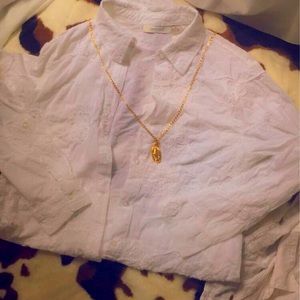 White blouse with floral white stitching design